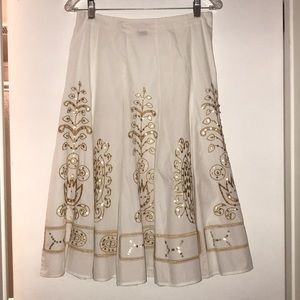 Gorgeous gold embroidery on white a-line skirt.